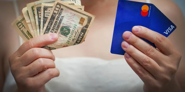 cash versus card - shutterstock 