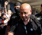 Gradu Cârpaci este însoțit de polițiști pe aeroportul internațional Henri Coandă din Otopeni, 27 iulie 2026 Inquam Photos George Călin1 jpg