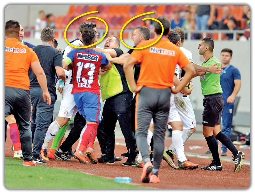 
    Fotbalistul campioanei  a fost ţinut de Toşca şi  de un agent de pază  pentru a nu-l agresa pe  duşmanul Stoica   
