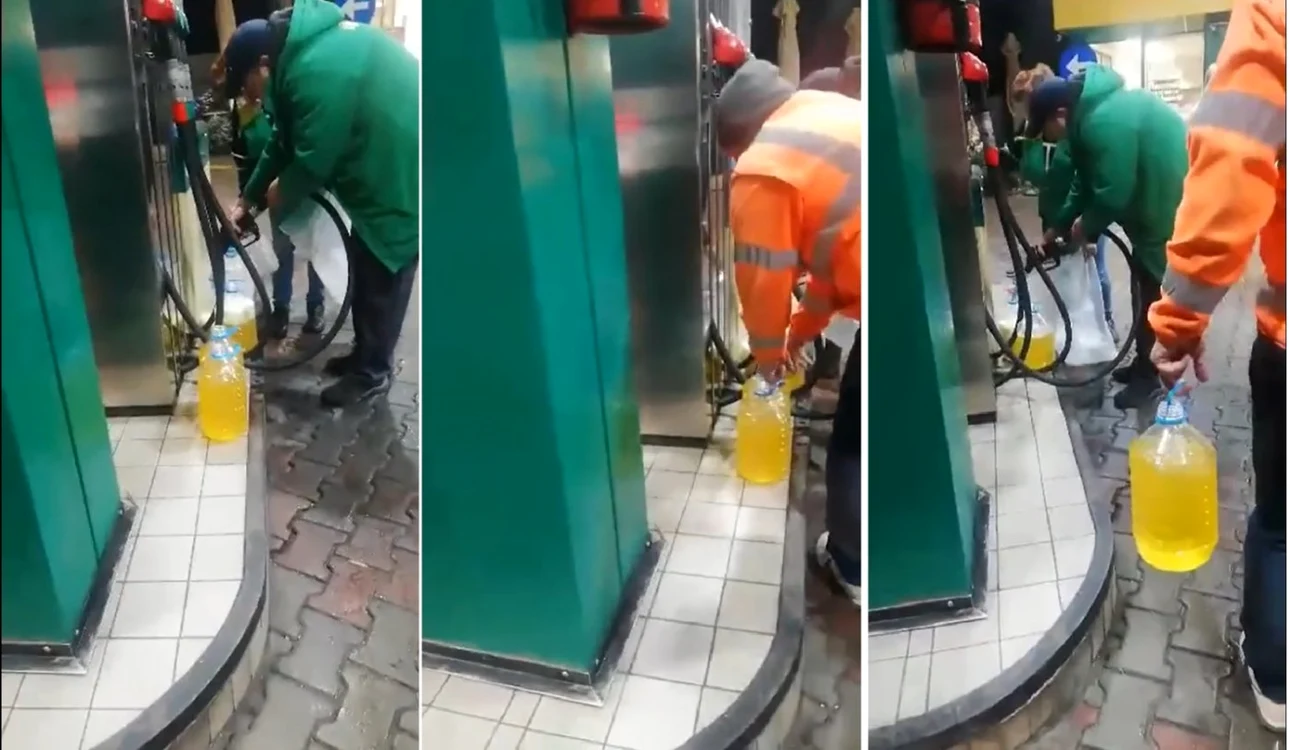 Alimentarea la o benzinărie de pe DN 7/ în Vâlcea, stopată, în timp ce angajaţii se aprovizionează cu bidoane de plastic Foto captură video