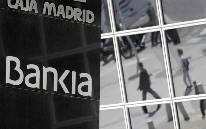 Grupul spaniol Bankia a fost salvat cu fonduri publice pentru a evita falimentul. FOTO Mediafax/AFP