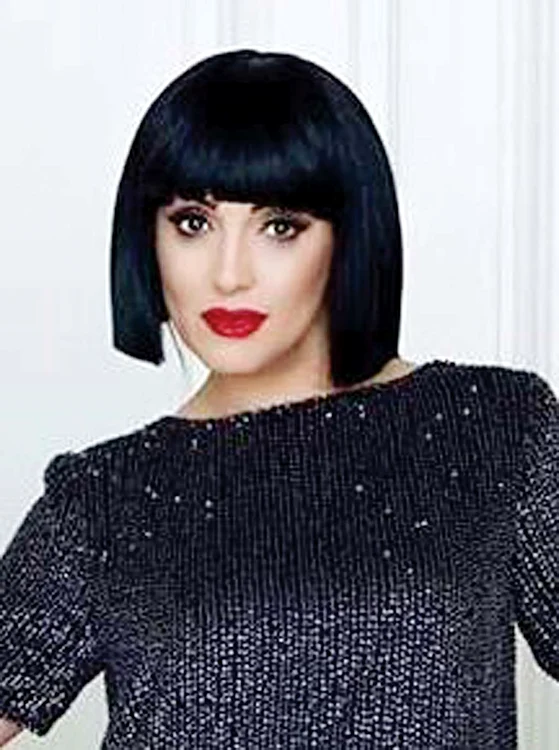 Pe scenă preferă peruca bob, cu breton