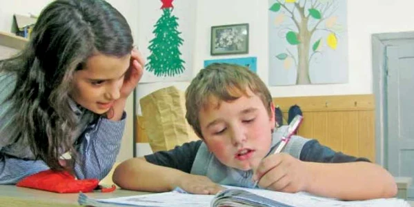 Andreea Drişcu s-a simţit bine în postura de educatoare şi este tentată de o carieră în învăţământ 