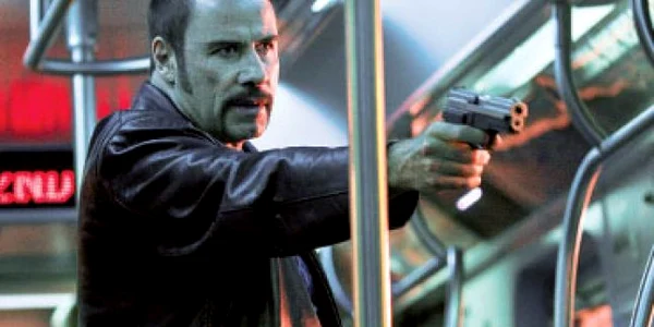 Travolta, personajul negativ din „1 2 3 S-a furat un tren“