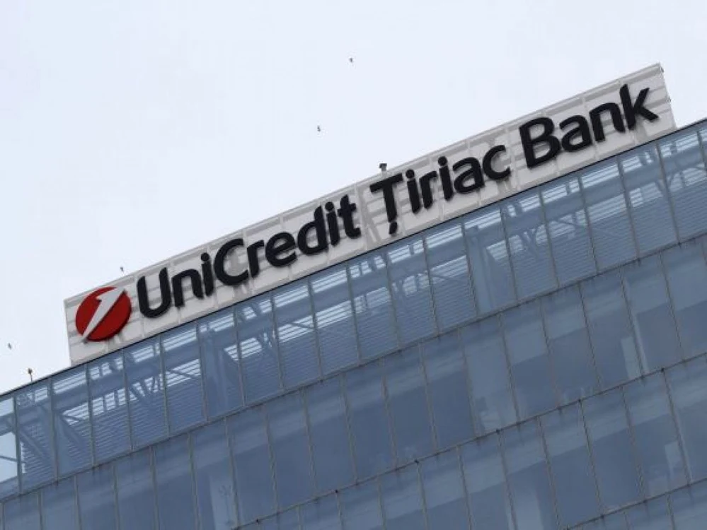 Unicredit a cumpărat în 2015 participaţia de 45% pe care omul de afaceri Ion Ţiriac o deţinea la subsidiara din România    FOTO Mediafax