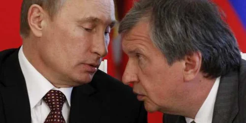 Vladimir Putin şi directorul Rosneft Igor Secin FOTO AP