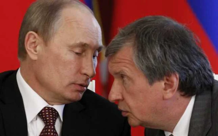 Vladimir Putin şi directorul Rosneft Igor Secin FOTO AP