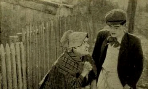 Robert Harron and Gertrude Norman in The Tender Hearted Boy (1913) (cropped) jpg