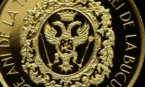 BNR lansează o monedă din aur cu tema 330 de ani de la tipărirea Bibliei de la Bucureşti jpeg