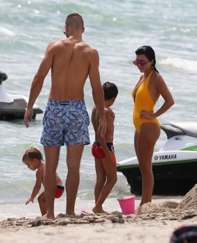 Kourtney & Khloe Kardashian Hit The Beach In Miami jpeg