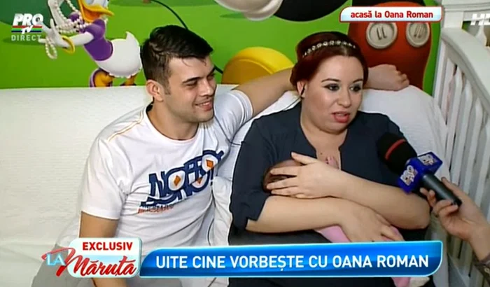 Oana Roman, în braţe cu fetiţa ei, Maria Isabela. (captură Pro TV)
