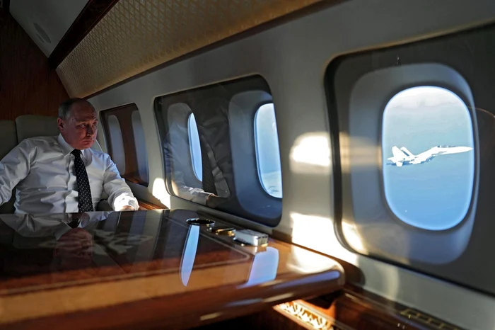 Președintele rus Vladimir Putin în avionul prezidențial/ FOTO:Arhiva