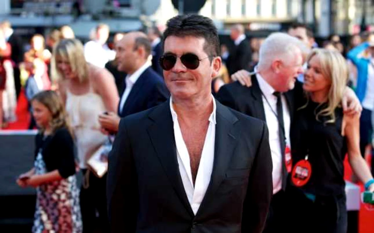 Vestea
că Simon Cowell va deveni tată cu atât mai surprinzătoare cu cât
acesta a declarat, în urmă cu câţiva ani, că nu se vede în
postura de tată şi presa a speculat că ar fi homosexual FOTO AFP