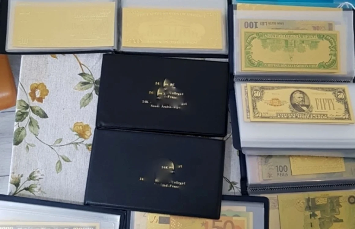 Banii şi alte bunuri confiscate de la hackeri din Vâlcea şi Bistriţa Năsăud în urma unei operaţiuni demarată de Poliţia din Italia Foto DIICOT