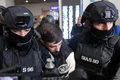 Vlad Baltateanu este escortat de politisti 3
