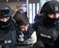 Vlad Baltateanu este escortat de politisti 3