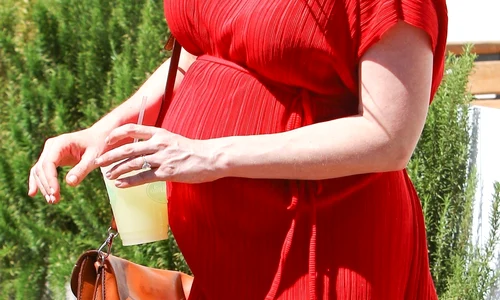 Pregnant Kirsten Dustin is stunning in red jpeg