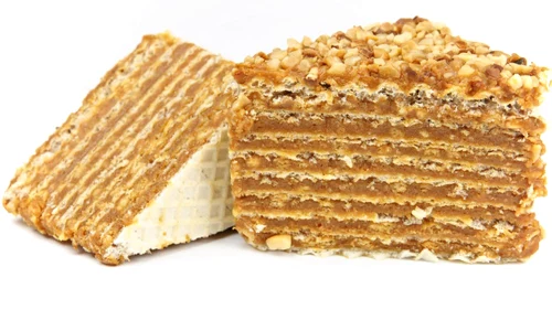 layered caramel cake isolated on white jpeg