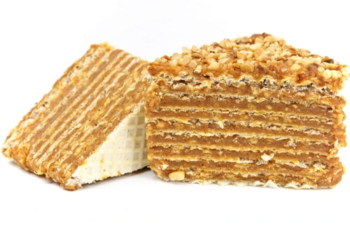 layered caramel cake isolated on white jpeg