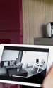 close up woman checking security camera jpg