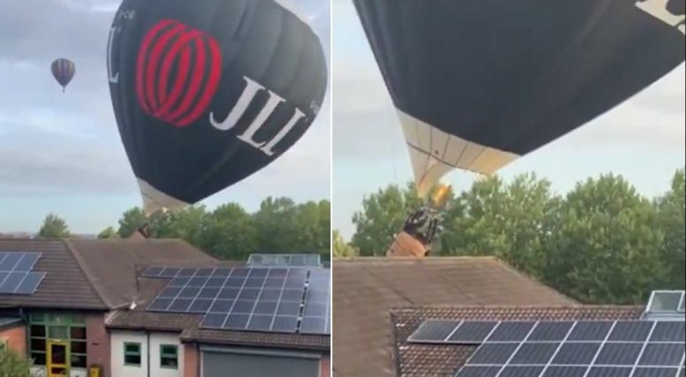 Un balon cu aer cald aproape s-a răsturnat, după ce s-a lovit de acoperișul unei școli, în timpul unui festival