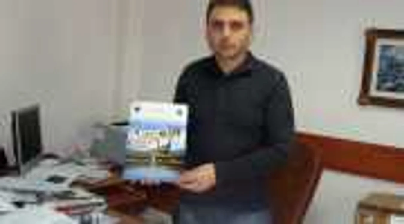 Ion Didoiu, secretatul Primariei Calimanesti, promoveaza statiunea la targurile internationale