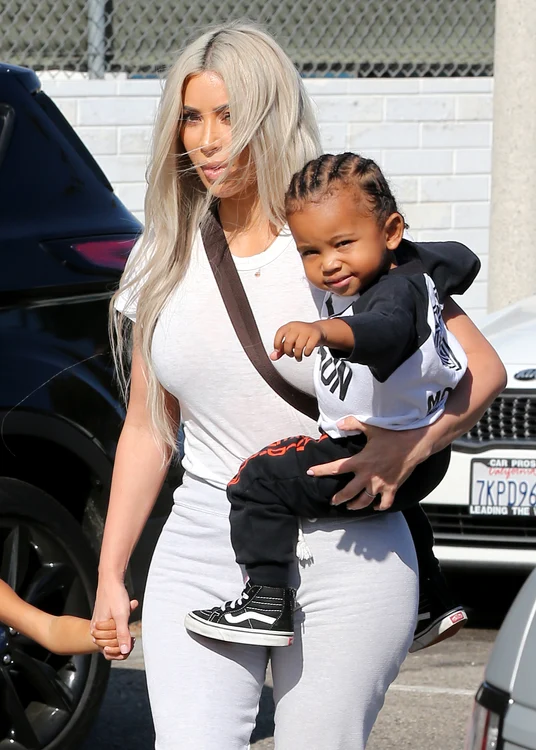 Kim Kardashian and Kanye West arrive to film at a Bumper car party in Los Angeles jpeg