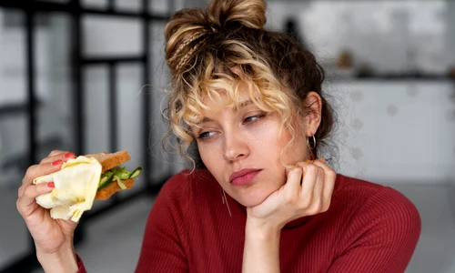 young woman with messy bun hair style jpg