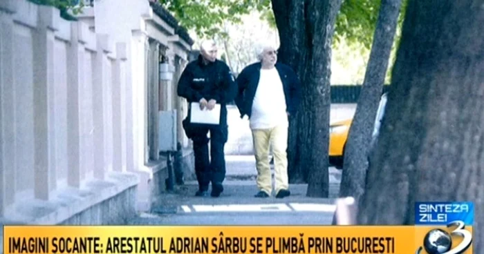 Adrian Sîrbu era escortat către o clinică de stomatologie FOTO Captură Antena3