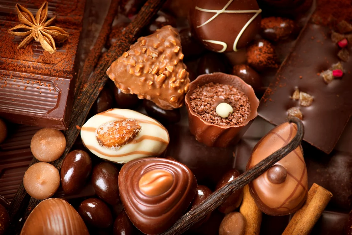 38253359   chocolates background  praline chocolate sweets jpeg