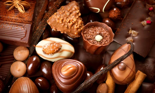 38253359   chocolates background  praline chocolate sweets jpeg