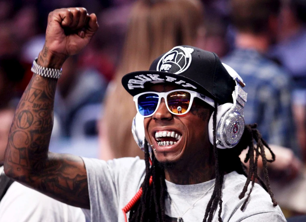 
    Lil Wayne e mare iubitor de sport  