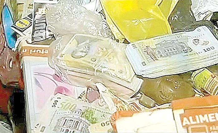 Anchetatorii au găsit  68.000 de lei în  locuinţa soţilor Zaharia