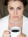 closeup serious nice businesswoman with coffee jpg