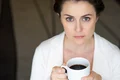 closeup serious nice businesswoman with coffee jpg