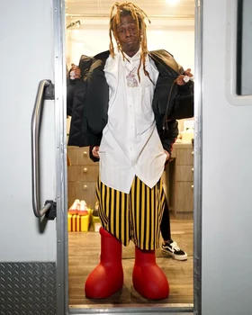 Lil Wayne a fost și el surprins purtând imensele cisme de cauciuc / Foto: Instagram