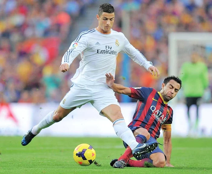 
    Ronaldo şi Xavi  au fost adversari  în duelurile  Real-Barcelona  