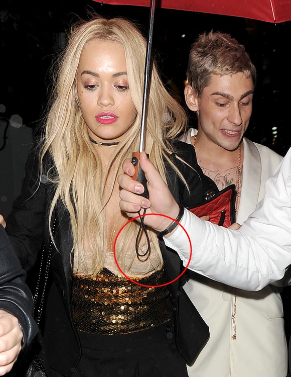 Rita Ora leaving China Tang restaurant in the pouring rain, following her stylist Kyle Devolle's birthday jpeg