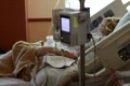 femeie pat spital jpg