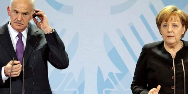 Cancelarul german, Angela Merkel, şi premierul elen, George Papandreou. Merkel i-a acuzat pe greci de lenevie