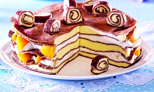 tort de clatite cu budinca si piersici jpeg