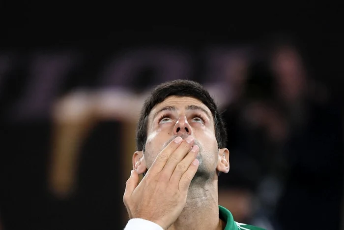 Novak Djokovic a devenit primul tenismen cu patru trofee câştigate la Australian Open