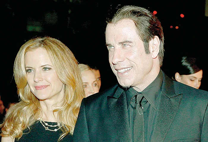 E căsătorit de 23 de ani cu Kelly Preston
