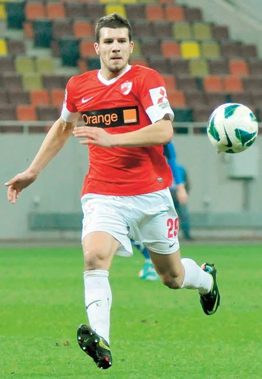 
    George  Ţucudean  