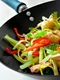 Stir fry with mixed vegetables and chicken in a wok jpeg