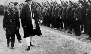 Romanian Politician Corneliu Zelea Codreanu wears Romanian peasant dress inspecting Iron guards fascist movement 1934 webp