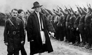 Romanian Politician Corneliu Zelea Codreanu wears Romanian peasant dress inspecting Iron guards fascist movement 1934 webp