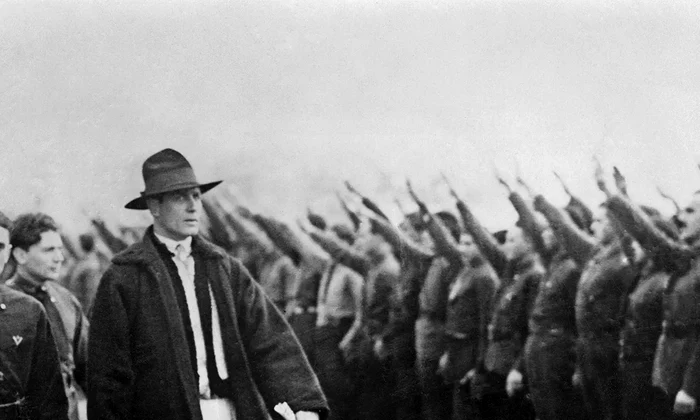 Romanian Politician Corneliu Zelea Codreanu wears Romanian peasant dress inspecting Iron guards fascist movement 1934 webp