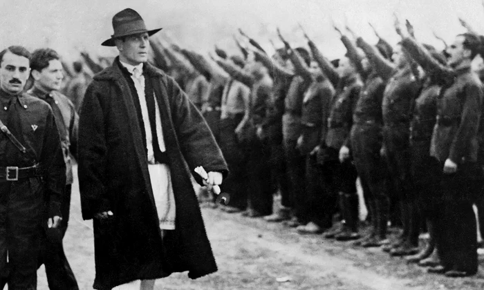 Romanian Politician Corneliu Zelea Codreanu wears Romanian peasant dress inspecting Iron guards fascist movement 1934 webp