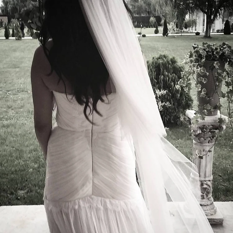 Mireasa, Teodora Bordeianu, a purtat o rochie albă, din tulle